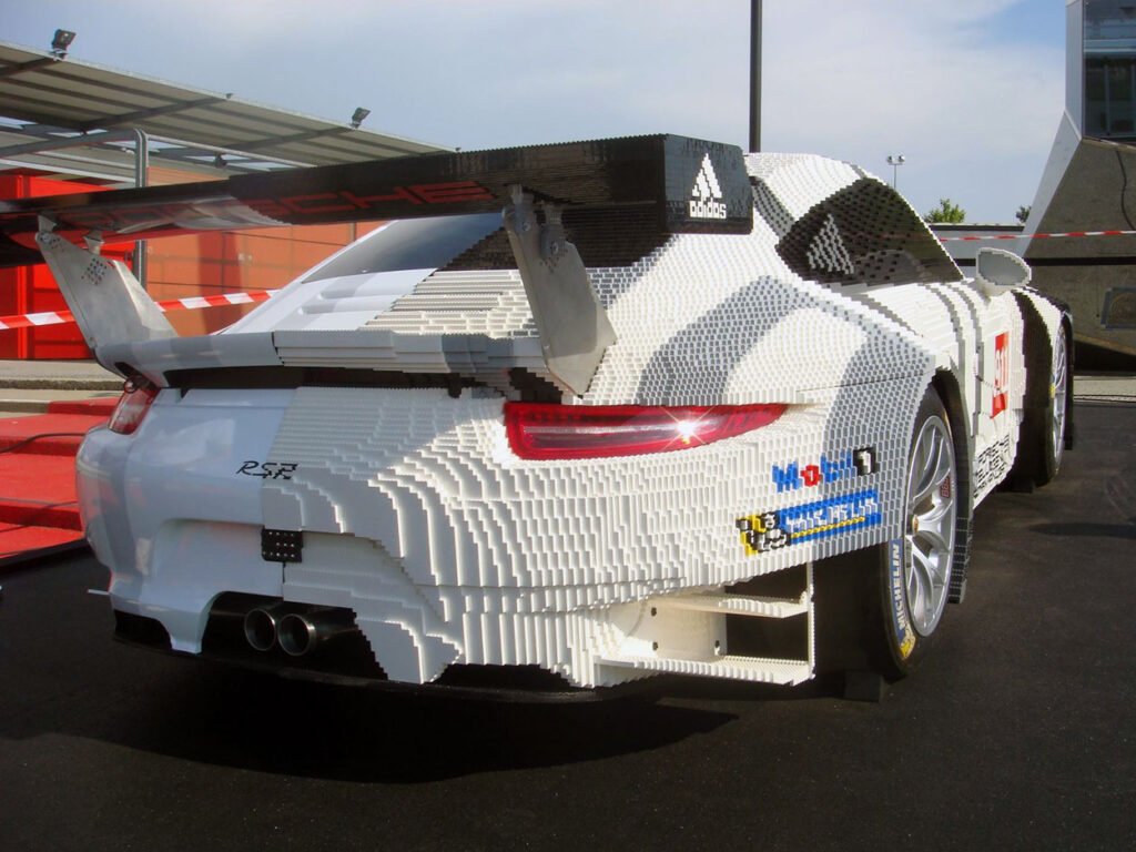 Rear view of a life-size Porsche 911 RSR built partly from LEGO bricks